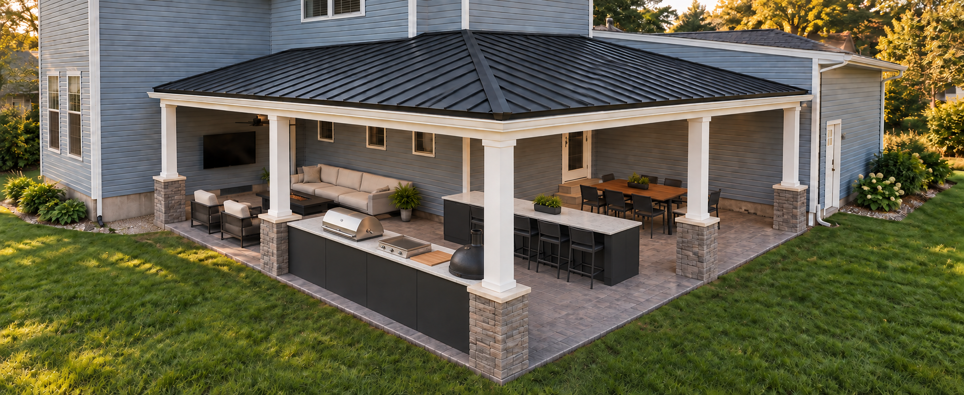 Earlier finished five-post patio with stone bases and white PVC wraps